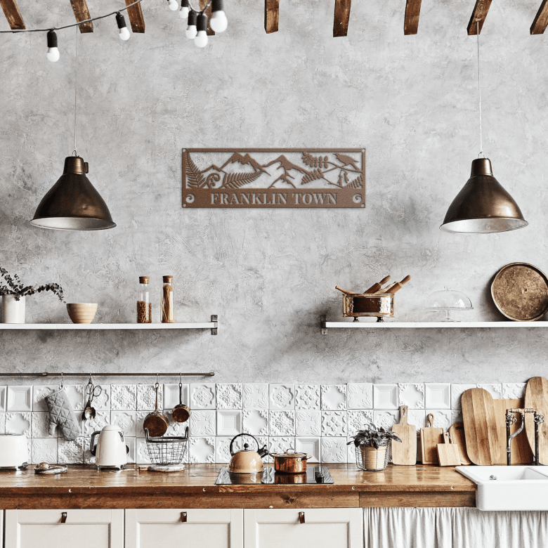 New Zealand-inspired copper steel wall art with ponga fern and maunga, displayed in a cozy rustic kitchen