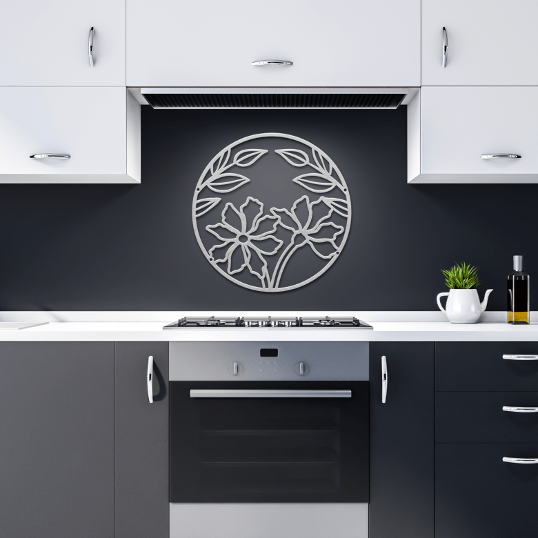 Intuitive silver moon and flower metal art in a dark kitchen, merging celestial calm with design
