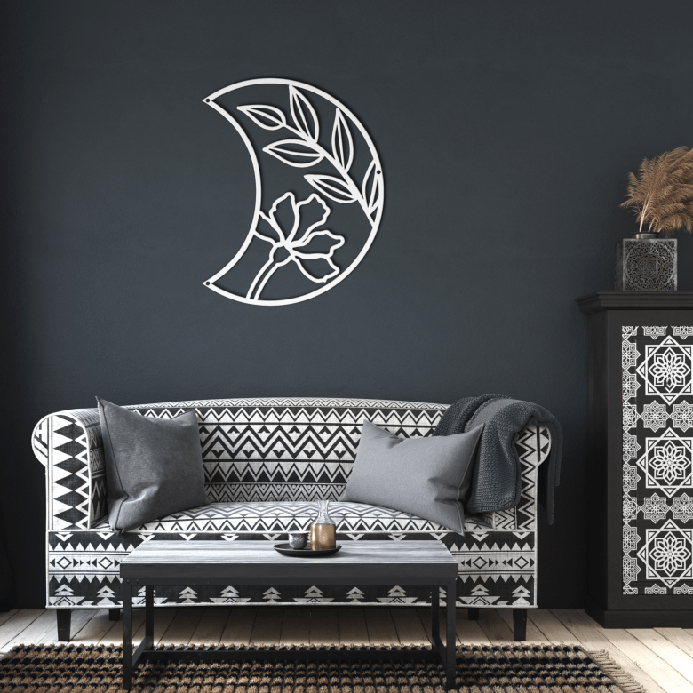 White Half Moon Floral Metal Wall Art contrasted against a dark living room wall — symbolizing clarity and calm in holistic home interiors.