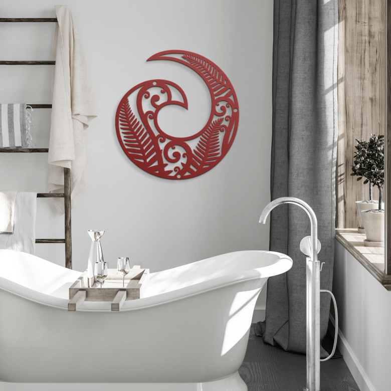 Red Koru spiral wall decor in modern bathroom with warm tones