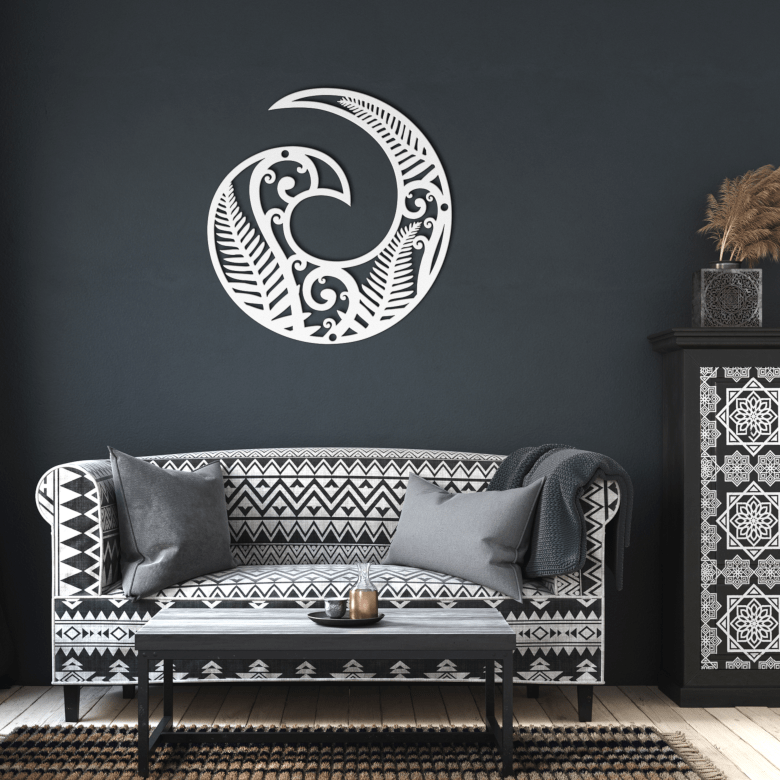 White Koru metal wall art in contemporary dark-toned living room