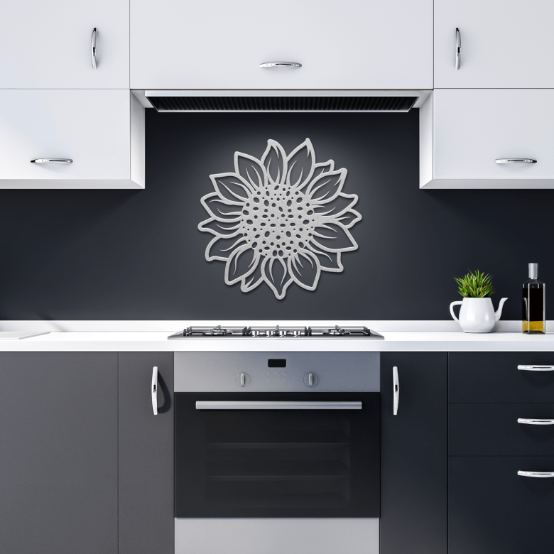 Sleek silver sunflower steel wall art mounted in a dark modern kitchen, adding contrast and contemporary floral elegance to the interior.