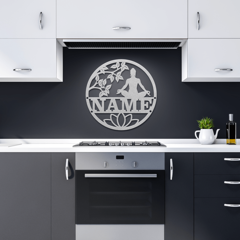 Silver yoga pose metal artwork featured in sleek modern kitchen