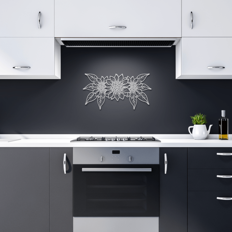 Silver triple sunflower metal wall art in a dark modern kitchen, reflecting light and enhancing contemporary home decor.